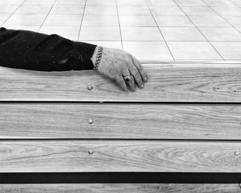 Close-up of man hand on table