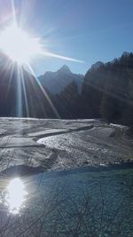 Scenic view of mountains against sky during winter