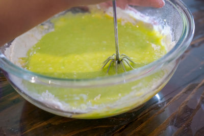 Mixing pandan green batter or dough for cake or muffin or pancake.