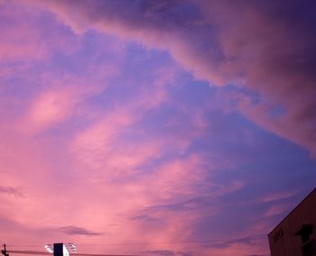 High section of building against cloudy sky