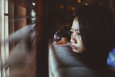 Portrait of woman with dog
