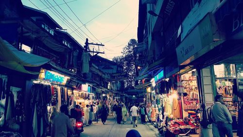 People on street market at night