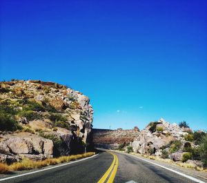 Road against blue sky