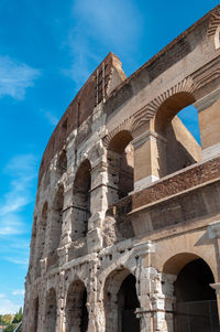 Low angle view of old ruins against sky