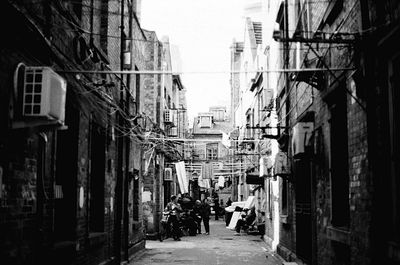 Alley amidst buildings in city