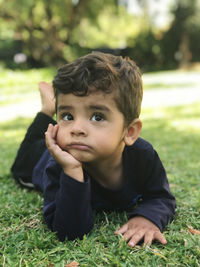 Portrait of cute boy at park
