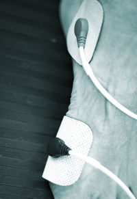 High angle view of electrodes on table