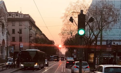 City street and buildings against sky