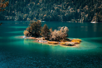 Scenic view of swimming pool by lake