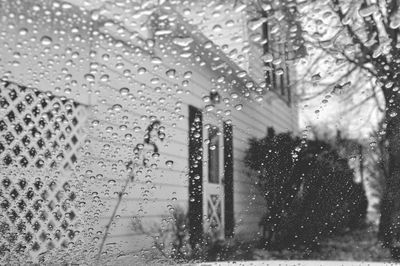 House seen through wet glass