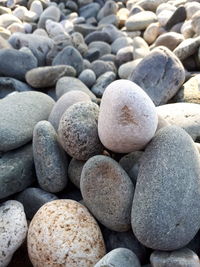 Full frame shot of pebbles on beach