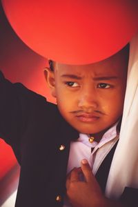 Close-up of cute boy in costume