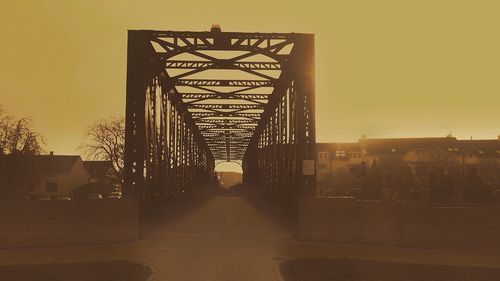 View of bridge against clear sky at sunset