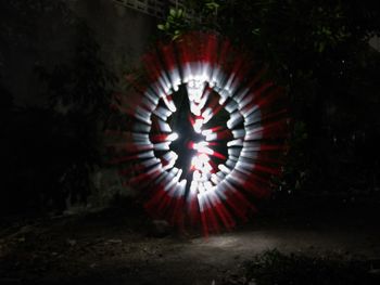 Digital composite image of illuminated light at night