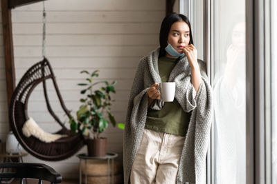 Young woman using mobile phone