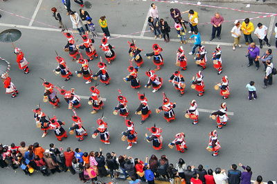 High angle view of chinese new year parade on street in city