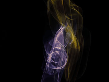 Light painting against black background