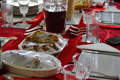 Close-up of wine glasses on table