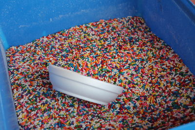 Close-up of sprinkles in container