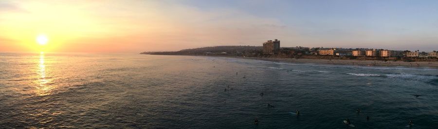 Scenic view of sea at sunset