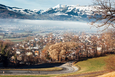 Aerial view of city against sky