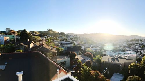 Buildings against sky at bernal heights on sunny day