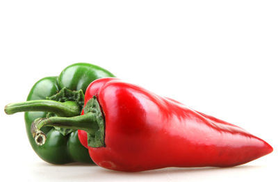 Close-up of red bell pepper against white background