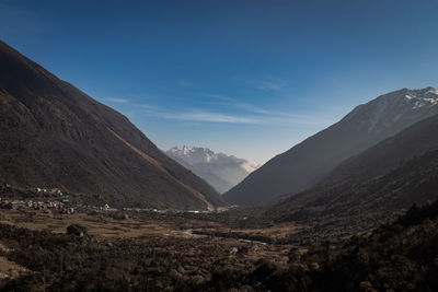 Scenic view of mountains against sky