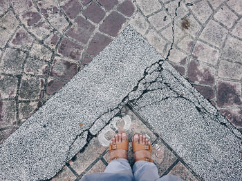 Low section of woman standing on floor