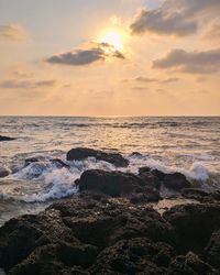 Scenic view of sea against sky during sunset