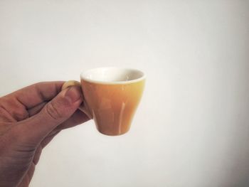 Glass of coffee cup against white background