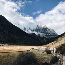 Scenic view of snowcapped mountains against sky