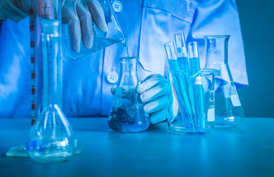 Close-up of blue glass on table