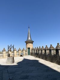 View of historical building against clear blue sky