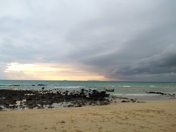 Scenic view of beach against sky