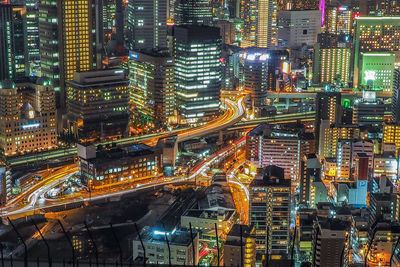 Illuminated cityscape at night