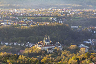 High angle view of townscape and trees in city