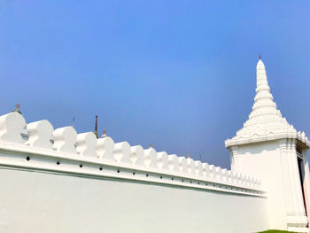 Low angle view of building against blue sky