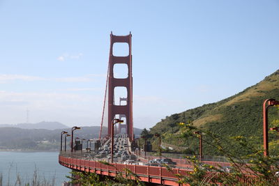 Bridge over bay against sky