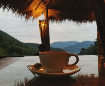 Close-up of coffee cup on table