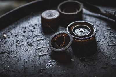 High angle view of rusty metal on table