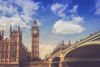 Low angle view of westminster bridge and big ben against sky