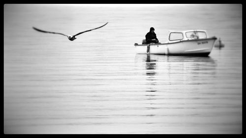 Reflection of woman in water