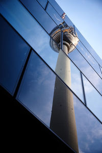 Reflection of berlin tower on glass building