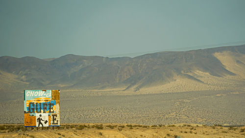 Scenic view of desert against clear sky