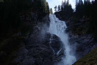Scenic view of waterfall in forest