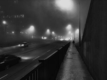 Illuminated street lights at night