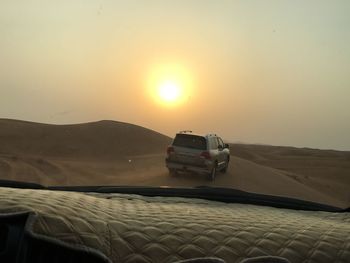 Scenic view of mountains against sky during sunset