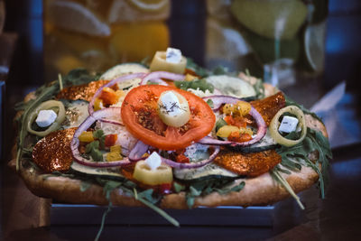 Close-up of pizza served on table