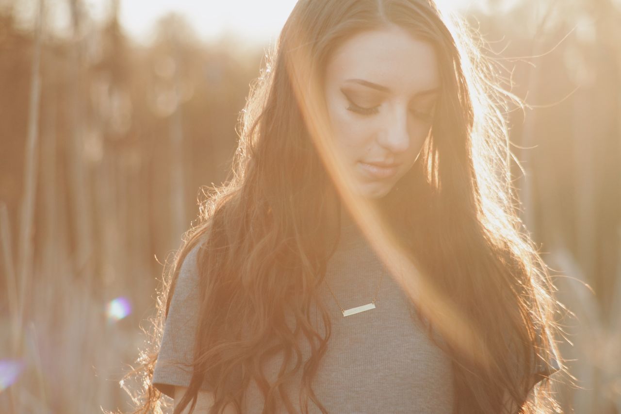 long hair, beauty, sunlight, beautiful people, headshot, beautiful woman, young adult, portrait, close-up, one person, people, outdoors, adult, only women, young women, one young woman only, day, one woman only, nature, adults only